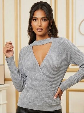 Jennifer Lopez EUC Metallic Knit ribbed Top. Cross over feature studded wrist M